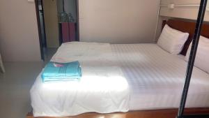 Postel nebo postele na pokoji v ubytování SMILE HOME GUESTHOUSE