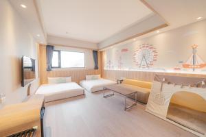 Postel nebo postele na pokoji v ubytování Hotel Liyaou