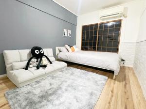 Postel nebo postele na pokoji v ubytování 高田馬場4分 最大7人 02