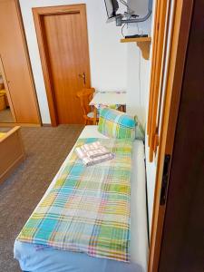 Postel nebo postele na pokoji v ubytování Burgerhof