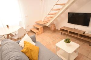 TV a/nebo společenská místnost v ubytování NORAY Home
