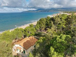 an aerial view of a house and the beach at Villa Moscariello - Beach & Sea in Ascea