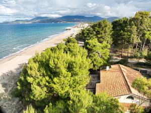 an aerial view of a beach with trees and a house at Villa Moscariello - Beach & Sea in Ascea
