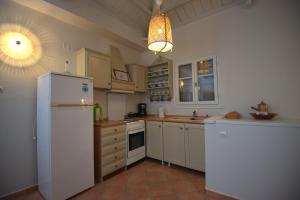 Kuchyň nebo kuchyňský kout v ubytování Likavgies Comfort Maisonettes