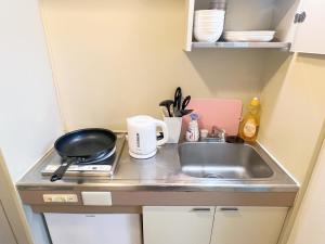 东京Ikebukuro Sugamo 最大4人B5的带水槽和柜台的小厨房