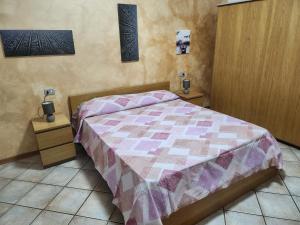 Postel nebo postele na pokoji v ubytování Elisa Adda House
