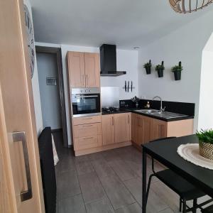 Nhà bếp/bếp nhỏ tại La calaisienne