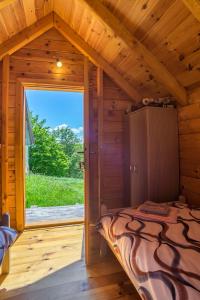 Un pat sau paturi într-o cameră la Maple bungalows
