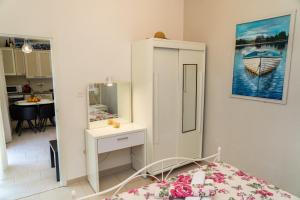 Kuchyň nebo kuchyňský kout v ubytování Apartmani Perko