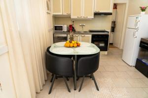 Kuchyň nebo kuchyňský kout v ubytování Apartmani Perko