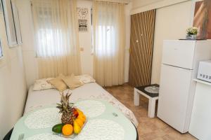 Kuchyň nebo kuchyňský kout v ubytování Apartmani Perko