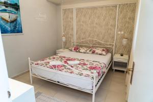 Postel nebo postele na pokoji v ubytování Apartmani Perko
