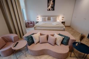 Giường trong phòng chung tại Boulevard Boutique B&B