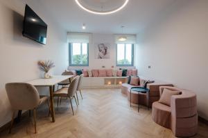 TV/trung tâm giải trí tại Boulevard Boutique B&B