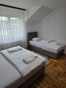 Katil atau katil-katil dalam bilik di Apartmani Zlatna Kruna