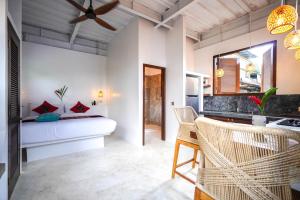 Letto o letti in una camera di Alchemy Studio Ubud