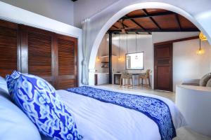 Letto o letti in una camera di Alchemy Studio Ubud