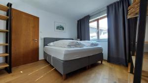 Llit o llits en una habitació de FRANZ by Miha
