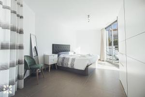 Posteľ alebo postele v izbe v ubytovaní Villa Dunamoon by Abahana Villas