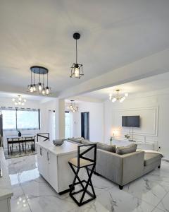 TV/trung tâm giải trí tại Comfy Home Apart - Appartement T2 meublé Haut Standing Bonapriso, Douala