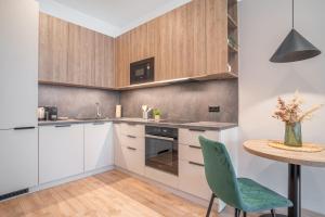 Køkken eller tekøkken på Patronka Apartments - Stylish apartment with a divided sleeping area + 11 billeder