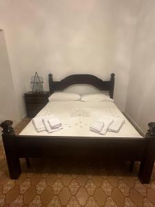 Postel nebo postele na pokoji v ubytování Massimo Beachfront Apartment