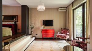 TV a/nebo společenská místnost v ubytování Relax in Style Boutique hotel