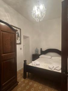 Postel nebo postele na pokoji v ubytování Massimo Beachfront Apartment