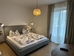 Katil atau katil-katil dalam bilik di Dolomites Smart Holidays