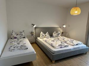 Katil atau katil-katil dalam bilik di Dolomites Smart Holidays