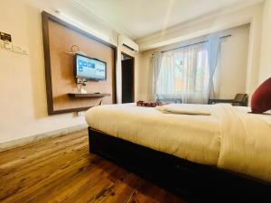 Sjónvarps- og/eða afþreyingartæki á Hotel Liv Inn