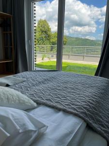Una cama o camas en una habitación de Apartament Wisła Siglany