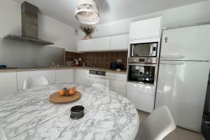 Η κουζίνα ή μικρή κουζίνα στο Nice and cozy apartment in the heart of Leucate