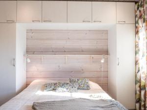 Ένα ή περισσότερα κρεβάτια σε δωμάτιο στο Holiday Home Hillakka a by Interhome