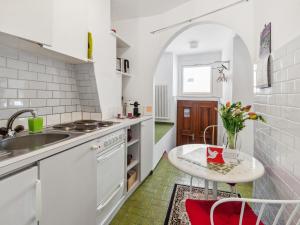 A kitchen or kitchenette at Studio Casa Schalom-1 by Interhome