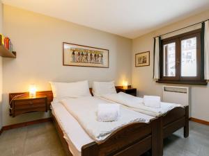 Postel nebo postele na pokoji v ubytování Apartment Residenza Chesa Margun 34-2 by Interhome