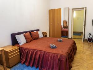 Postel nebo postele na pokoji v ubytování Apartment Manes Residence by Interhome