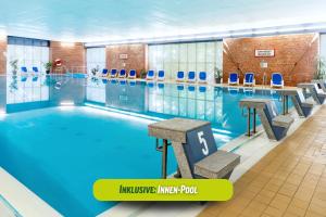 an image of a swimming pool in a building at AHORN Seehotel Templin in Templin