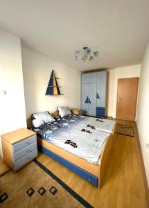 Postel nebo postele na pokoji v ubytování ES Apartment - Skopje + 6 fotografií