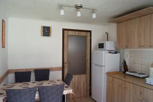 Kuchyň nebo kuchyňský kout v ubytování Apartmány u Jozefa