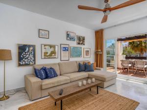 a living room with a couch and a table at Apartment Las Adelfas by Interhome in Marbella