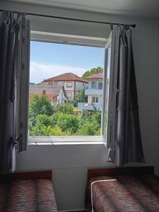 Postel nebo postele na pokoji v ubytování Vila Teodora