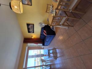 une vue de tête sur un salon avec un escalier et une fenêtre dans l'établissement Apartment Les Rivages de Coudoulière-2 by Interhome, à Six-Fours-les-Plages 31 autres photos