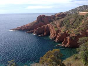 an aerial view of a rocky island in the ocean at Domaine de Valescure T3 Rez De Jardin in Saint-Raphaël