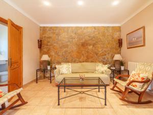 A seating area at Holiday Home Can Butxet by Interhome