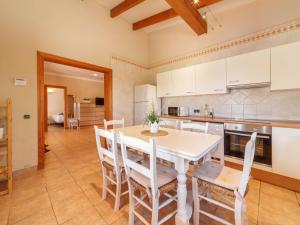 A kitchen or kitchenette at Holiday Home Can Butxet by Interhome