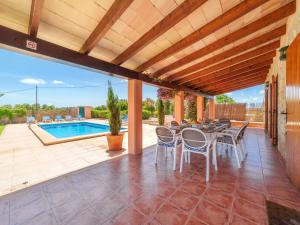 The swimming pool at or close to Holiday Home Can Butxet by Interhome