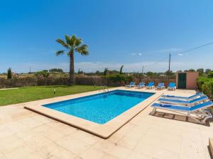 The swimming pool at or close to Holiday Home Can Butxet by Interhome