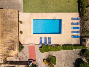 The swimming pool at or close to Holiday Home Can Butxet by Interhome