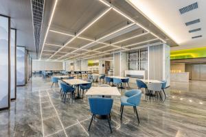 Εστιατόριο ή άλλο μέρος για φαγητό στο Holiday Inn Express Qidong Economic Zone by IHG